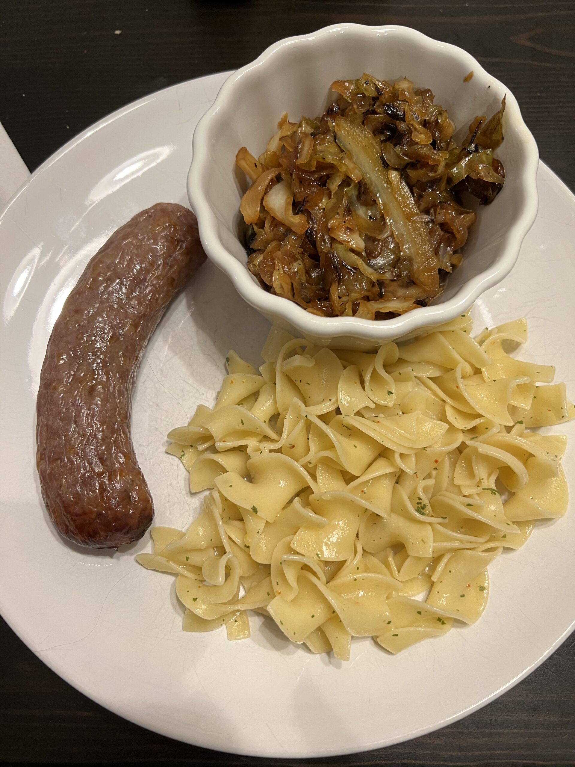 Brats with Buttered Noodles & Sweet and Sour Cabbage