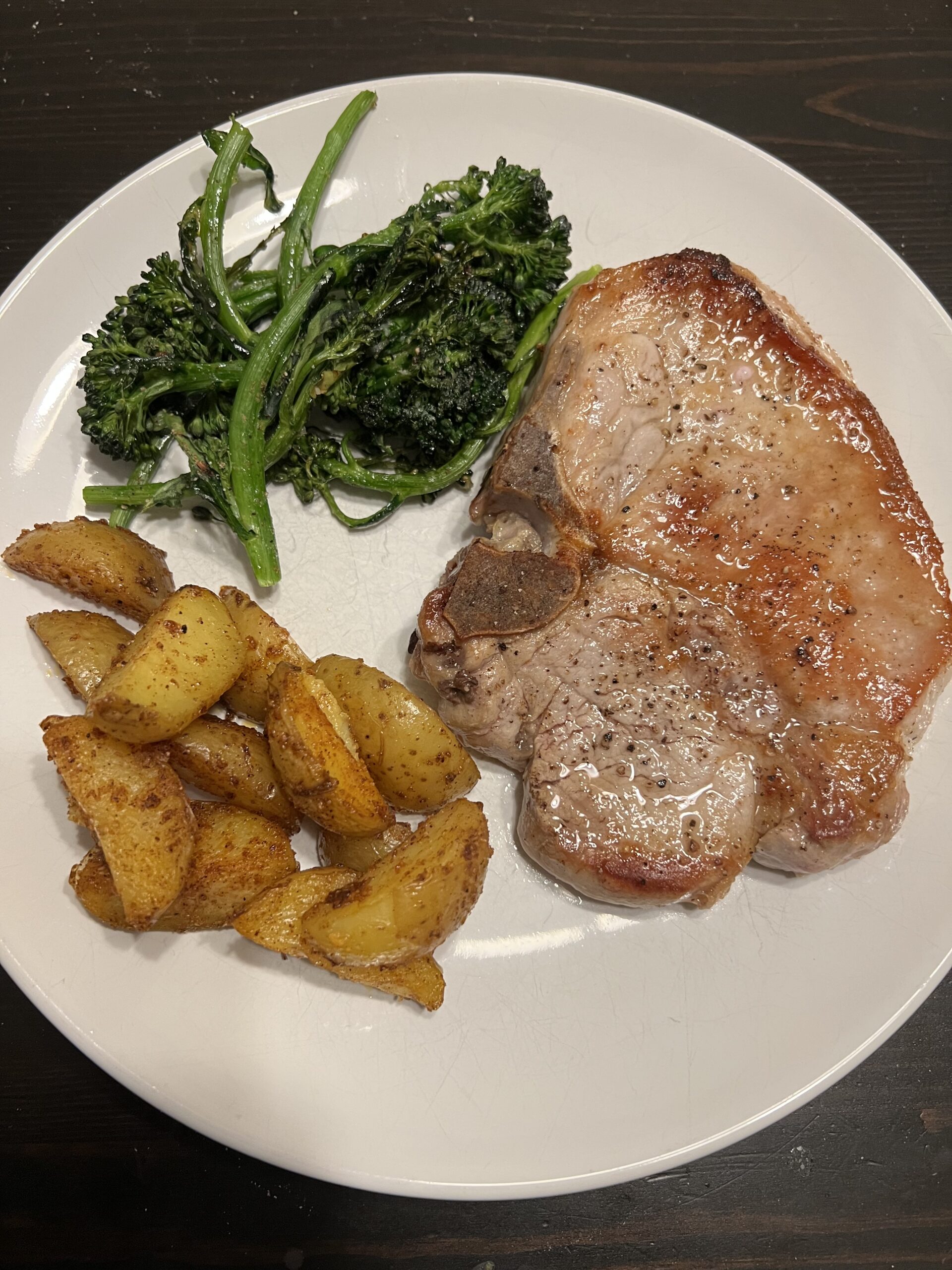 Pan Seared Pork Chops with Roasted Potatoes and Greens
